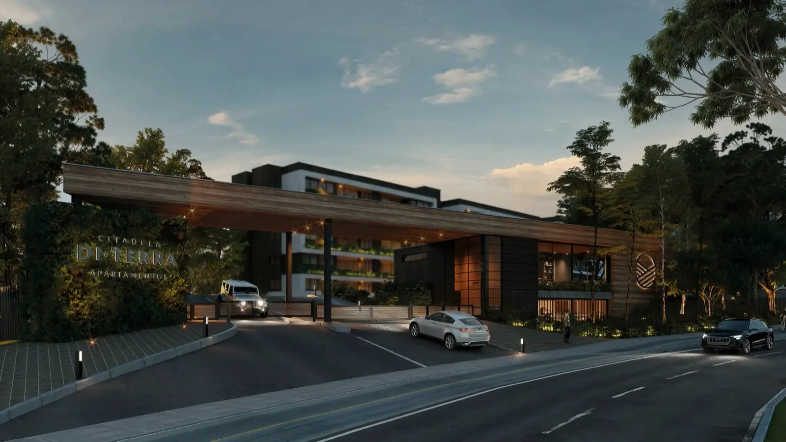 Acceso a un proyecto residencial al atardecer